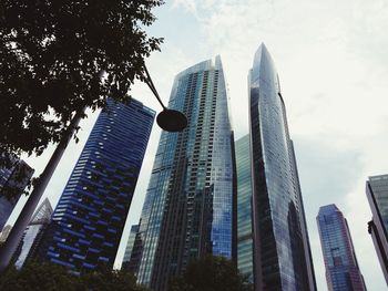 Low angle view of skyscrapers against sky