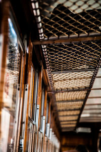 Low angle view of books on ceiling