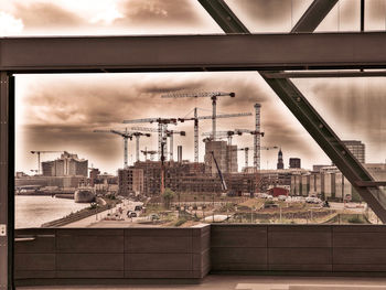 Buildings in city against sky