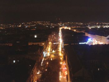 Illuminated cityscape at night