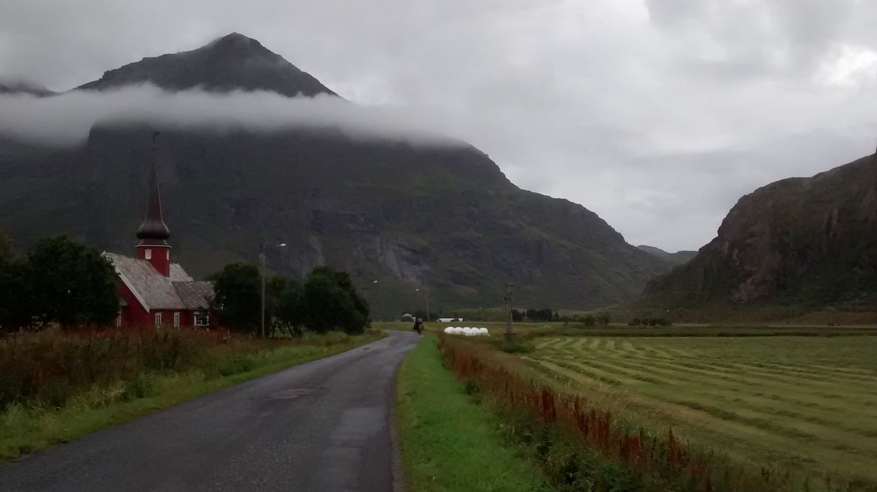 mountain, the way forward, road, transportation, landscape, country road, mountain range, sky, diminishing perspective, vanishing point, tranquil scene, scenics, tranquility, nature, beauty in nature, empty road, road marking, cloud - sky, non-urban scene, rural scene