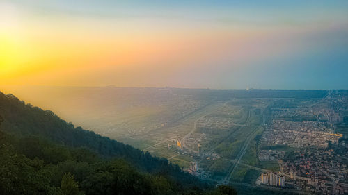 High angle view of landscape against sky during sunset