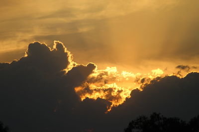 Low angle view of clouds in sky during sunset