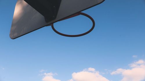 Low angle view of umbrella against sky