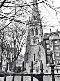 Low angle view of bell tower against sky