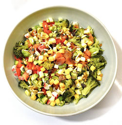 High angle view of healthy food in bowl on white marble table. healthy poke.