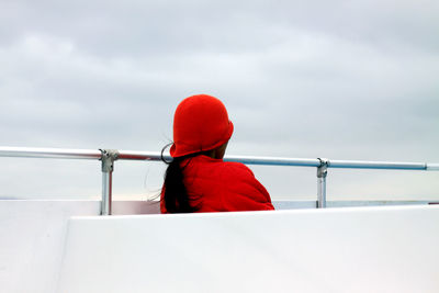 Rear view of woman on boat deck