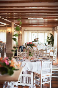 View of empty chairs and table in restaurant