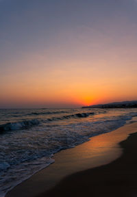 Scenic view of beach during sunset