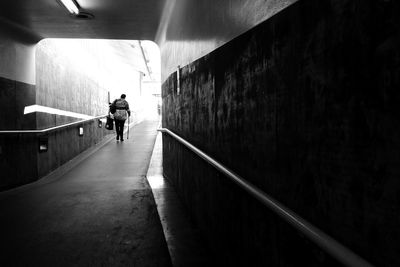 Full length of woman in tunnel