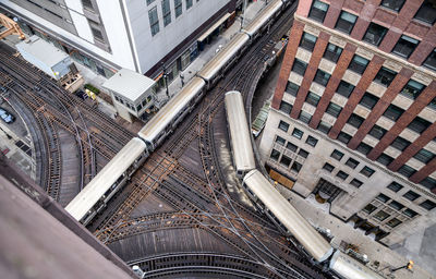 High angle view of road amidst buildings in city