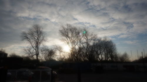 Road against cloudy sky at sunset