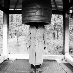 Man inside a bell