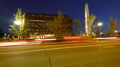 Light trails on city street at night