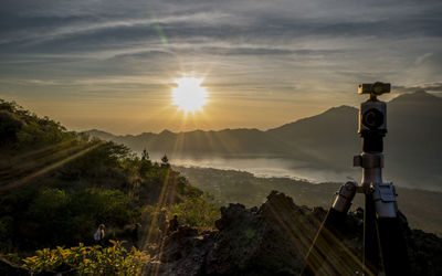 Scenic view of mountains against sky during sunset