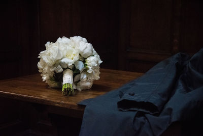 Close-up of white rose on table