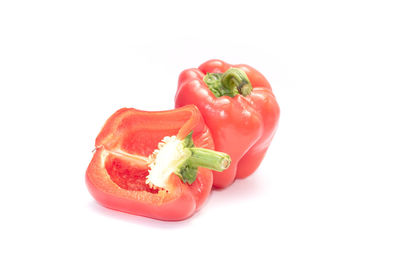 Close-up of red bell pepper against white background