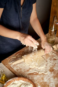 Midsection of woman preparing food