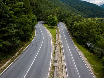 High angle view of road amidst trees