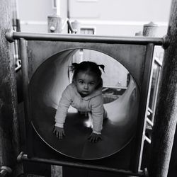 Portrait of cute boy playing in playground