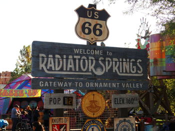 Low angle view of information sign in city