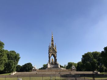 Low angle view of building against blue sky