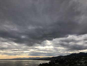 Scenic view of dramatic sky over beach