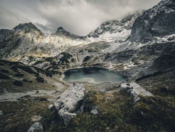 Scenic view of snowcapped mountains against sky