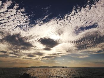 Scenic view of sea against dramatic sky