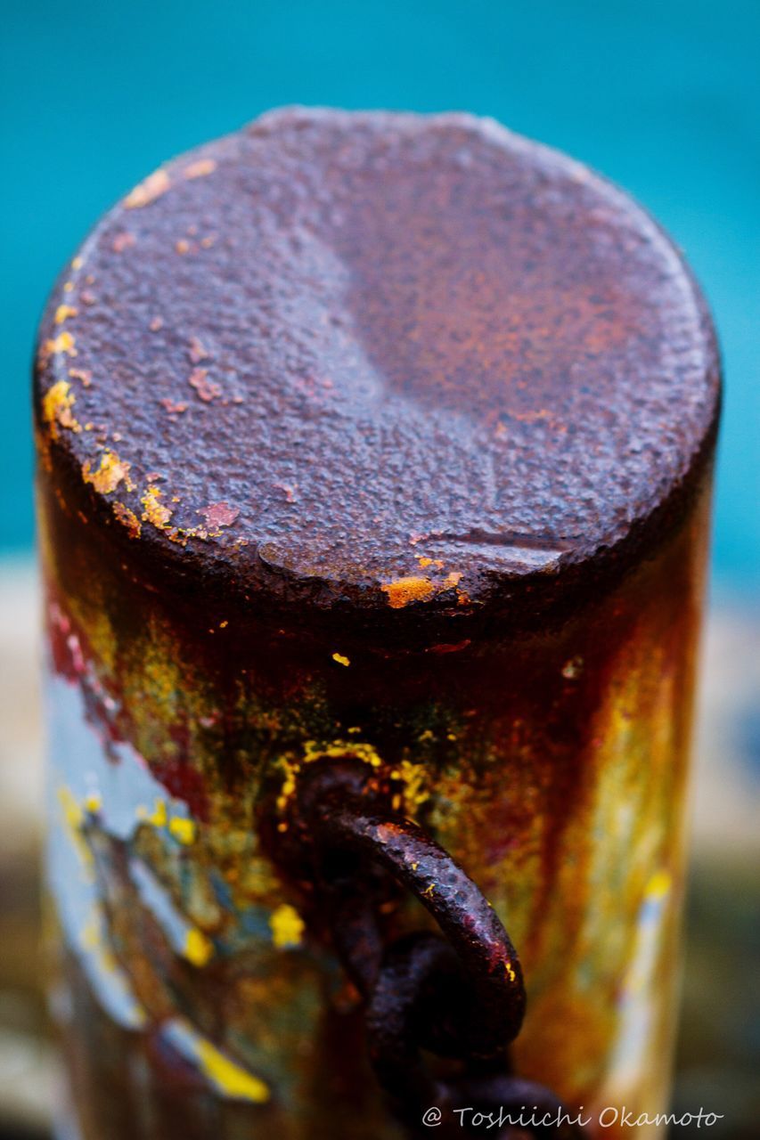 CLOSE-UP OF RUSTY OBJECT