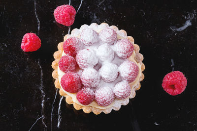 Close-up of dessert with raspberries on table