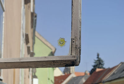 Smiley face on glass window