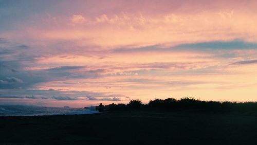 Scenic view of sunset over sea