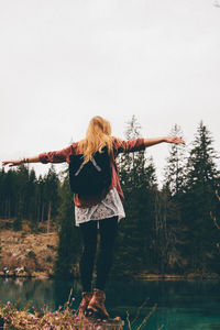 Close-up of woman standing by railing