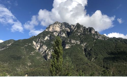 Low angle view of majestic mountains against sky