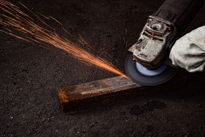 High angle view of person using hand tool