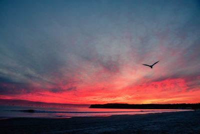 Scenic view of sea against sky at sunset