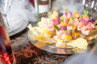 Close-up of flowers in plate on table