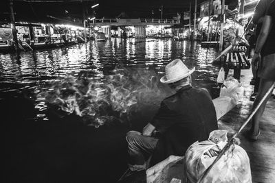 People working in market at night