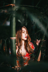 Portrait of young woman looking away