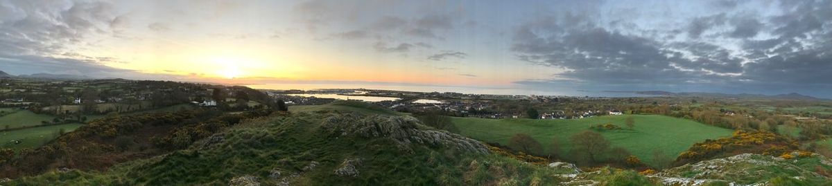 Panoramic view of sea against sky during sunset