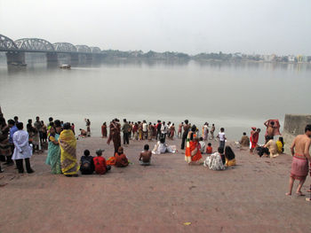 People on steps by ganges river