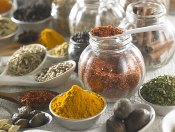 Close-up of various spices on burlap