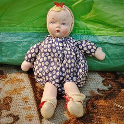 High angle view of doll on carpet at home