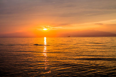 Scenic view of sea at sunset