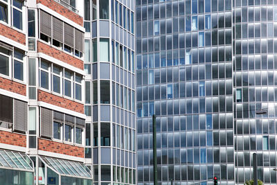 Low angle view of modern buildings in city