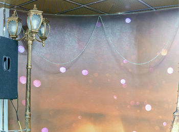 Close-up of illuminated lighting equipment