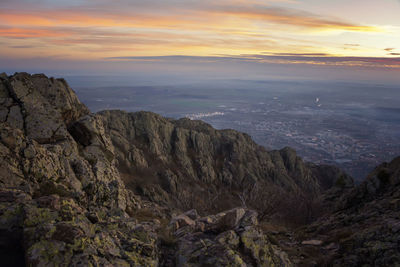 Scenic view of mountains against sky during sunset