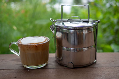 Close-up of coffee cup on table