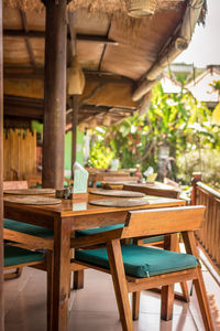 Empty chairs and tables in restaurant